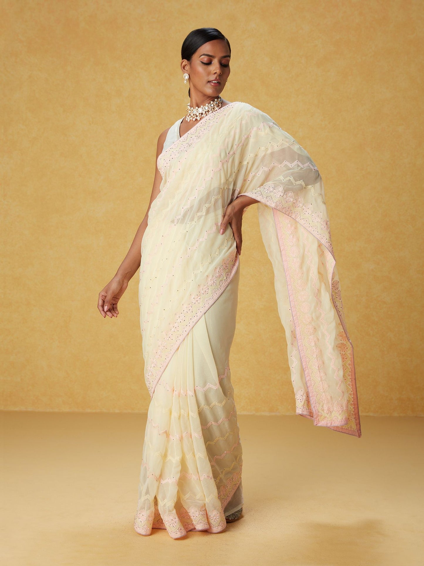 Likha Yellow Georgette Embellished Saree with Unstitched Blouse LIKSAR101 (Free Size)